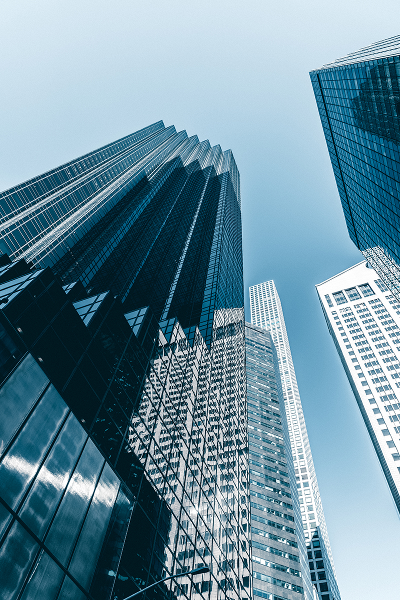 A vertical low angle shot of the buildings of New York